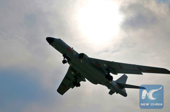 Picture shows a Chinese airplane is taking off from the base of China air forces, Nov. 27, 2015. (Photo: Xinhua/Li Ping)