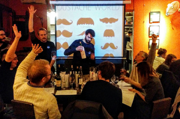 A wine-guessing game at Cafe de la Poste. (Photo provided to China Daily) A wine-guessing game at Cafe de la Poste. (Photo provided to China Daily)
