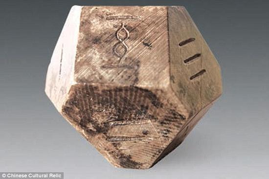 The dice found in the tomb has 14 facades. (Photo/China Cultural Relics) The dice found in the tomb has 14 facades. (Photo/China Cultural Relics)