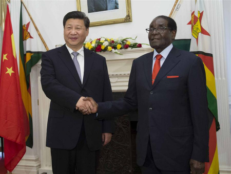 Chinese President Xi Jinping (L) holds talks with Zimbabwean President Robert Mugabe in Harare, Zimbabwe, Dec. 1, 2015. (Xinhua/Huang Jingwen) Chinese President Xi Jinping (L) holds talks with Zimbabwean President Robert Mugabe in Harare, Zimbabwe, Dec. 1, 2015. (Xinhua/Huang Jingwen)