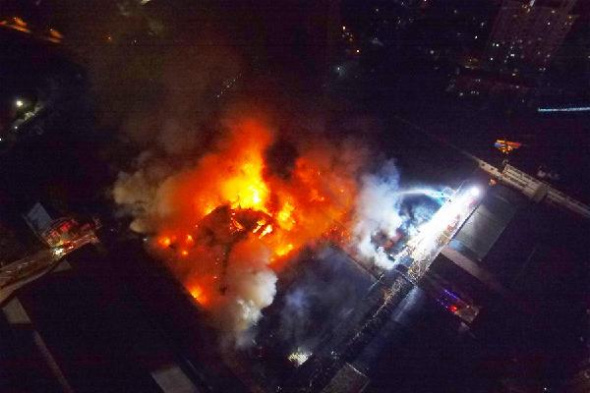 Photo taken on Dec. 2, 2015 shows the fire site of a warehouse in Yangpu District of Shanghai, east China. The fire has been put out. No casualties were reported. (Photo: Xinhua/Shen Chunchen) Photo taken on Dec. 2, 2015 shows the fire site of a warehouse in Yangpu District of Shanghai, east China. The fire has been put out. No casualties were reported. (Photo: Xinhua/Shen Chunchen)