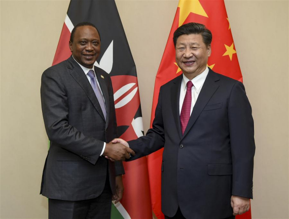 Chinese President Xi Jinping (R) meets with Kenyan President Uhuru Kenyatta in Johannesburg, South Africa, Dec. 3, 2015. (Photo; Xinhua/Xie Huanchi) Chinese President Xi Jinping (R) meets with Kenyan President Uhuru Kenyatta in Johannesburg, South Africa, Dec. 3, 2015. (Photo; Xinhua/Xie Huanchi)