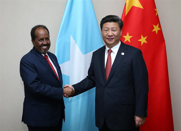 Chinese President Xi Jinping (R) meets with Somali President Hassan Sheikh Mohamoud in Johannesburg, South Africa, Dec. 4, 2015. (Xinhua/Pang Xinglei) Chinese President Xi Jinping (R) meets with Somali President Hassan Sheikh Mohamoud in Johannesburg, South Africa, Dec. 4, 2015. (Xinhua/Pang Xinglei)