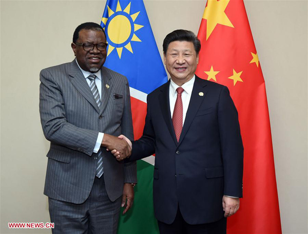 Chinese President Xi Jinping (R) meets with Namibian President Hage Geingob in Johannesburg, South Africa, Dec. 4, 2015. (Xinhua/Zhang Duo) Chinese President Xi Jinping (R) meets with Namibian President Hage Geingob in Johannesburg, South Africa, Dec. 4, 2015. (Xinhua/Zhang Duo)