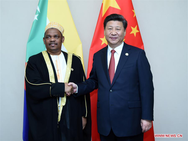 Chinese President Xi Jinping (R) meets with his Comoros counterpart Ikililou Dhoinine in Johannesburg, South Africa, Dec. 4, 2015. (Xinhua/Zhang Duo) Chinese President Xi Jinping (R) meets with his Comoros counterpart Ikililou Dhoinine in Johannesburg, South Africa, Dec. 4, 2015. (Xinhua/Zhang Duo)