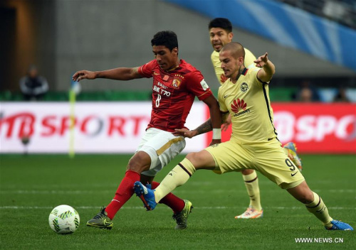 Paulinho (L) of China's Guangzhou Evergrande vies with Dario Benedetto of Mexico's Club America during the Club World Cup quarter-final match in Osaka, Japan, Dec. 13, 2015. Guangzhou Evergrande won the match 2-1 and advanced to the semifinal. (Photo: Xinhua/Liu Dawei) Paulinho (L) of China's Guangzhou Evergrande vies with Dario Benedetto of Mexico's Club America during the Club World Cup quarter-final match in Osaka, Japan, Dec. 13, 2015. Guangzhou Evergrande won the match 2-1 and advanced to the semifinal. (Photo: Xinhua/Liu Dawei)