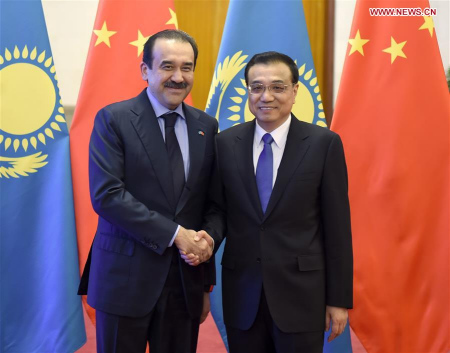 Chinese Premier Li Keqiang (R) holds talks with Kazakhstan's Prime Minister Karim Masimov in Beijing, capital of China, Dec. 14, 2015. (Photo: Xinhua/Zhang Duo) Chinese Premier Li Keqiang (R) holds talks with Kazakhstan's Prime Minister Karim Masimov in Beijing, capital of China, Dec. 14, 2015. (Photo: Xinhua/Zhang Duo)