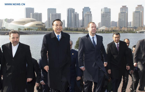 Chinese Premier Li Keqiang (2nd L, front) and other participants of the 14th prime ministers' meeting of the Shanghai Cooperation Organization (SCO) visit Zhengdong New District in Zhengzhou, central China's Henan Province, Dec. 15, 2015. (Xinhua/Xie Huanchi) Chinese Premier Li Keqiang (2nd L, front) and other participants of the 14th prime ministers' meeting of the Shanghai Cooperation Organization (SCO) visit Zhengdong New District in Zhengzhou, central China's Henan Province, Dec. 15, 2015. (Xinhua/Xie Huanchi)