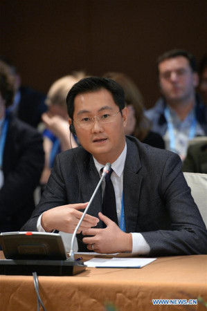Founder and CEO of Tencent Pony Ma speaks at a round-table discussion of Chinese and Russian enterprises in Wuzhen, east China's Zhejiang Province, Dec. 16, 2015. (Xinhua/Li Xin)