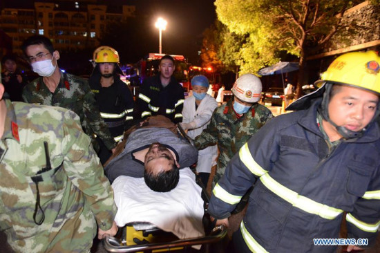 Rescuers transfer an injured man after a blast happened in the kitchen of a restaurant in the Xinluo District of Longyan City, southeast China's Fujian Province, Dec. 16, 2015. Seven people were killed in the explosion, which occurred Wednesday evening. Three others are receiving emergency treatment in a hospital. (Xinhua/Zhou Yangdong) Rescuers transfer an injured man after a blast happened in the kitchen of a restaurant in the Xinluo District of Longyan City, southeast China's Fujian Province, Dec. 16, 2015. Seven people were killed in the explosion, which occurred Wednesday evening. Three others are receiving emergency treatment in a hospital. (Xinhua/Zhou Yangdong)