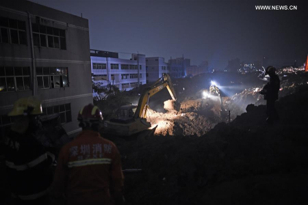Rescuers work at the landslide site of an industrial park in Shenzhen, south China's Guangdong Province, Dec. 20, 2015. (Xinhua/Mao Siqian) Rescuers work at the landslide site of an industrial park in Shenzhen, south China's Guangdong Province, Dec. 20, 2015. (Xinhua/Mao Siqian)