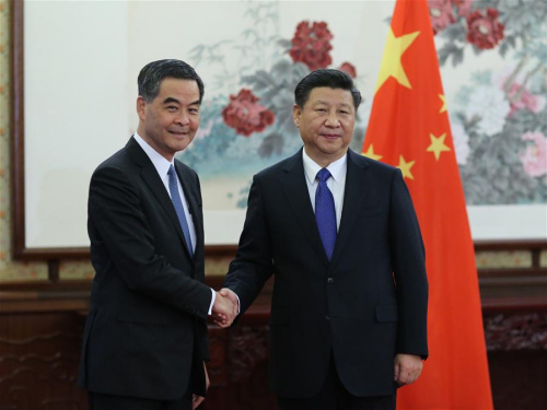 Chinese President Xi Jinping (R) meets with Hong Kong Special Administrative Region Chief Executive Leung Chun-ying in Beijing, capital of China, Dec. 23, 2015. Leung is in Beijing to report his work to the central government. (Photo: Xinhua/Lan Hongguang) Chinese President Xi Jinping (R) meets with Hong Kong Special Administrative Region Chief Executive Leung Chun-ying in Beijing, capital of China, Dec. 23, 2015. Leung is in Beijing to report his work to the central government. (Photo: Xinhua/Lan Hongguang)