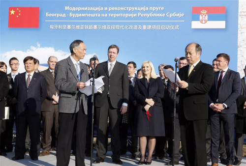 Wang Xiaotao, the deputy head of China's National Development and Reform Commission (Front-R), Chinese ambassador to Serbia Li Manchang (Front-L), Serbian Prime Minister Aleksandar Vucic (C) attend the ceremony of the opening of the construction works at the Belgrade-Budapest railway in Novi Sad, Serbia, Dec. 23, 2015. (Photo: Xinhua/Predrag Milosavljevic) Wang Xiaotao, the deputy head of China's National Development and Reform Commission (Front-R), Chinese ambassador to Serbia Li Manchang (Front-L), Serbian Prime Minister Aleksandar Vucic (C) attend the ceremony of the opening of the construction works at the Belgrade-Budapest railway in Novi Sad, Serbia, Dec. 23, 2015. (Photo: Xinhua/Predrag Milosavljevic)
