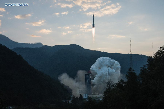 A Long March-3B carrier rocket carrying a new-generation Beidou satellite lifts off from the Xichang Satellite Launch Center in Xichang, southwest China's Sichuan Province, Sept. 30, 2015. China sent a new-generation satellite into orbit that will support its global navigation and positioning network at 7:13 a.m. Beijing Time Wednesday (2313 GMT Tuesday). It was the 20th satellite for the Beidou Navigation Satellite System (BDS).(Photo: Xinhua/Li Xiang) A Long March-3B carrier rocket carrying a new-generation Beidou satellite lifts off from the Xichang Satellite Launch Center in Xichang, southwest China's Sichuan Province, Sept. 30, 2015. China sent a new-generation satellite into orbit that will support its global navigation and positioning network at 7:13 a.m. Beijing Time Wednesday (2313 GMT Tuesday). It was the 20th satellite for the Beidou Navigation Satellite System (BDS).(Photo: Xinhua/Li Xiang)