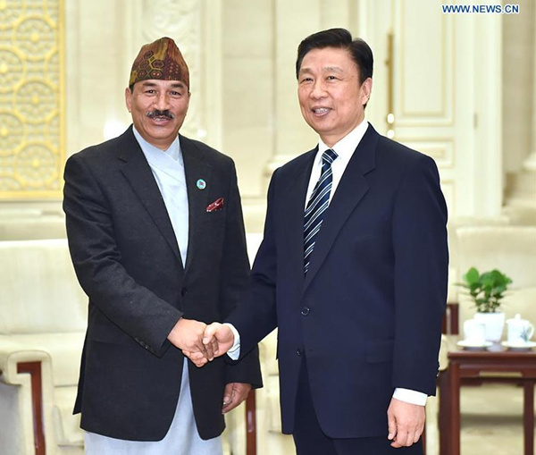 Chinese Vice President Li Yuanchao (R) meets with visiting Nepalese Deputy Prime Minister Kamal Thapa, also Nepal's foreign minister, in Beijing, capital of China, Dec. 24, 2015. (Photo: Xinhua/Li Tao) Chinese Vice President Li Yuanchao (R) meets with visiting Nepalese Deputy Prime Minister Kamal Thapa, also Nepal's foreign minister, in Beijing, capital of China, Dec. 24, 2015. (Photo: Xinhua/Li Tao)