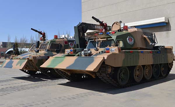 Firefighting tanks can cross half-meter-high obstacles and spray water as far as 65 meters. (Photo: China Daily/Zhang Lihong)