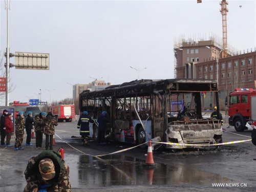 Firefighters work at the accident site of bus fire in Helan County, northwest China's Ningxia Hui Autonomous Region, Jan. 5, 2016. Fourteen people were killed and more than 30 others injured, after the bus caught fire Tuesday morning. (Photo: Xinhua/Li Ran) Firefighters work at the accident site of bus fire in Helan County, northwest China's Ningxia Hui Autonomous Region, Jan. 5, 2016. Fourteen people were killed and more than 30 others injured, after the bus caught fire Tuesday morning. (Photo: Xinhua/Li Ran)