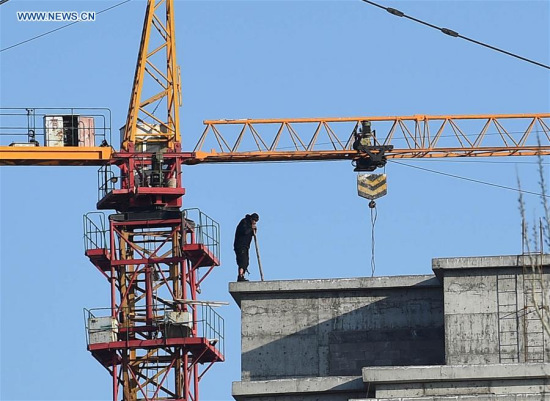 Suspect of the fatal bus fire is seen standing on top of a building against police in Helan County, northwest China's Ningxia Hui Autonomous Region, Jan. 5, 2016. According to local authorities, 17 people were killed by the bus fire. The suspected arsonist was arrested. (Photo: Xinhua/Wang Peng) Suspect of the fatal bus fire is seen standing on top of a building against police in Helan County, northwest China's Ningxia Hui Autonomous Region, Jan. 5, 2016. According to local authorities, 17 people were killed by the bus fire. The suspected arsonist was arrested. (Photo: Xinhua/Wang Peng)