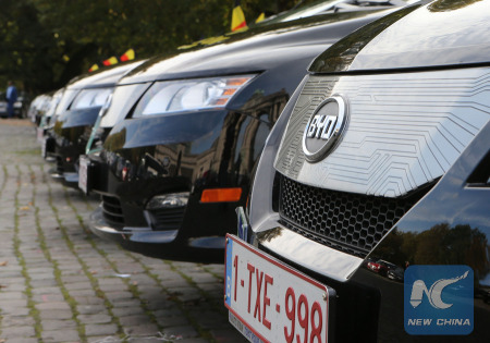 Photo taken on Oct. 15, 2014 shows the e6 taxis made by BYD, a Shenzhen based Chinese manufacturer of rechargeable batteries and automobiles, in Brussels, capital of Belgium. (Xinhua Photo) Photo taken on Oct. 15, 2014 shows the e6 taxis made by BYD, a Shenzhen based Chinese manufacturer of rechargeable batteries and automobiles, in Brussels, capital of Belgium. (Xinhua Photo)