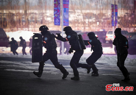 SWAT members take part in a drill at the stadiums for the 13th National Winter Games in Urumqi City, the capital of Northwest China's Xinjiang Uyghur Autonomous Region, Jan. 7, 2016. (Photo: China News Service/Liu Xin) SWAT members take part in a drill at the stadiums for the 13th National Winter Games in Urumqi City, the capital of Northwest China's Xinjiang Uyghur Autonomous Region, Jan. 7, 2016. (Photo: China News Service/Liu Xin)