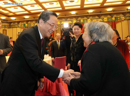 Yu Zhengsheng (L), chairman of the National Committee of Chinese People's Political Consultative Conference (CPPCC), attends a New Year gathering held by the CPPCC National Committee for spouses of late renowned social figures and national political advisors who were not members of the Communist Party of China (CPC), in Beijing, China, Jan. 26, 2016. (Xinhua/Liu Weibing) Yu Zhengsheng (L), chairman of the National Committee of Chinese People's Political Consultative Conference (CPPCC), attends a New Year gathering held by the CPPCC National Committee for spouses of late renowned social figures and national political advisors who were not members of the Communist Party of China (CPC), in Beijing, China, Jan. 26, 2016. (Xinhua/Liu Weibing)