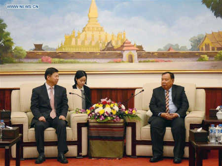 Bounnhang Vorachit, the newly-elected general secretary of the Central Committee of the Lao People's Revolutionary Party (LPRP) (R) meets with Xi Jinping's special envoy Song Tao (L) in Vientiane, Laos, Jan. 26, 2016. (Photo/Xinhua) Bounnhang Vorachit, the newly-elected general secretary of the Central Committee of the Lao People's Revolutionary Party (LPRP) (R) meets with Xi Jinping's special envoy Song Tao (L) in Vientiane, Laos, Jan. 26, 2016. (Photo/Xinhua)