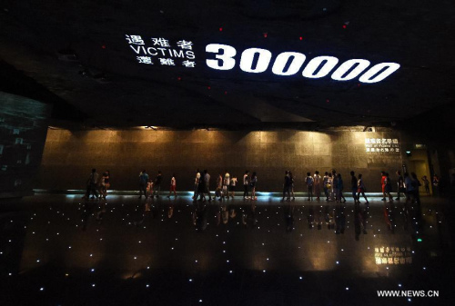 People visit the memorial hall of the victims of the Nanjing Massacre by Japanese invaders in Nanjing, capital of east China's Jiangsu Province, Aug. 15, 2015. (Photo: Xinhua/Sun Can) People visit the memorial hall of the victims of the Nanjing Massacre by Japanese invaders in Nanjing, capital of east China's Jiangsu Province, Aug. 15, 2015. (Photo: Xinhua/Sun Can)