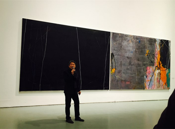 Artist Tan Ping address the opening ceremony of the exhibition in front of his works, including Carrying Out Romance through to the End(R) (Photo:Ecns.cn/Feng Shuang) Artist Tan Ping address the opening ceremony of the exhibition in front of his works, including Carrying Out Romance through to the End(R) (Photo:Ecns.cn/Feng Shuang)