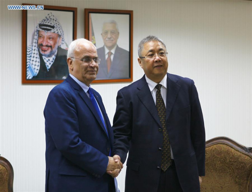 China's Special Envoy on Middle East affairs Gong Xiaosheng(R) shakes hands with Saeb Erekat, Palestinian chief negotiator and secretary general of Palestine Liberation Organization (PLO) executive committee during their meeting in Ramallah on Jan. 31, 2016. (Photo: Xinhua/Liu Liwei) China's Special Envoy on Middle East affairs Gong Xiaosheng(R) shakes hands with Saeb Erekat, Palestinian chief negotiator and secretary general of Palestine Liberation Organization (PLO) executive committee during their meeting in Ramallah on Jan. 31, 2016. (Photo: Xinhua/Liu Liwei)