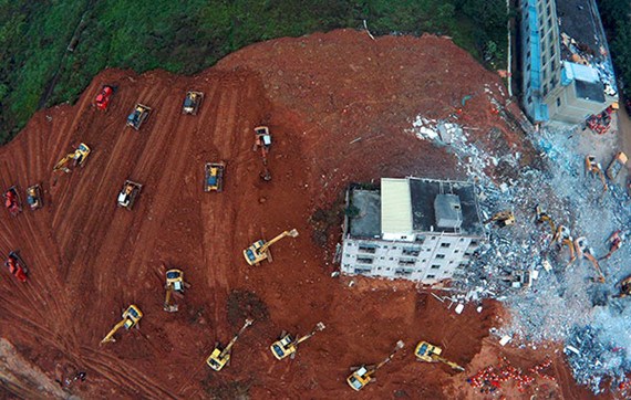 Rescue work continues in Shenzhen, Guangdong province, after a huge landslide of dirt and construction waste buried buildings on Sunday. (Photo: Xinhua/Jinliangkuai)