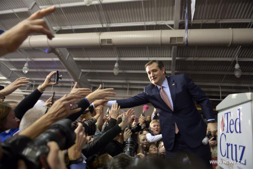 Republican presidential candidate Ted Cruz celebrates with supporters in Des Moines, capital of Iowa, the United States, Feb. 1, 2016. (Photo: Xinhua/Yin Bogu) Republican presidential candidate Ted Cruz celebrates with supporters in Des Moines, capital of Iowa, the United States, Feb. 1, 2016. (Photo: Xinhua/Yin Bogu)