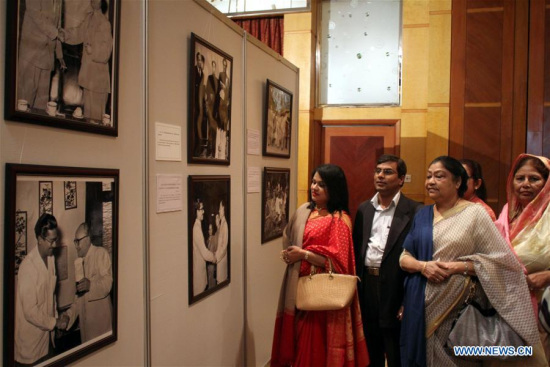 People visit a photo exhibition marking the 40th anniversary of the establishment of diplomatic relations between Bangladesh and China at Westin Hotel in Dhaka, Bangladesh, Feb. 1, 2016. (Photo: Xinhua/Shariful Islam) People visit a photo exhibition marking the 40th anniversary of the establishment of diplomatic relations between Bangladesh and China at Westin Hotel in Dhaka, Bangladesh, Feb. 1, 2016. (Photo: Xinhua/Shariful Islam)