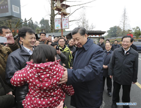 Chinese President Xi Jinping (R, front), also general secretary of the Communist Party of China (CPC) Central Committee and chairman of the Central Military Commission, talks with villagers while visiting revolutionary site in Jinggangshan, east China's Jiangxi Province, Feb. 2, 2016. (Photo: Xinhua/Lan Hongguang) Chinese President Xi Jinping (R, front), also general secretary of the Communist Party of China (CPC) Central Committee and chairman of the Central Military Commission, talks with villagers while visiting revolutionary site in Jinggangshan, east China's Jiangxi Province, Feb. 2, 2016. (Photo: Xinhua/Lan Hongguang)