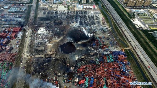 An aerial photo taken on Aug. 14, 2015 shows a huge hole at the core area of explosion site in Tianjin, north China. The death toll from explosions occurred on Wednesday night rises to 85 as of Saturday morning. (Photo/Xinhua) An aerial photo taken on Aug. 14, 2015 shows a huge hole at the core area of explosion site in Tianjin, north China. The death toll from explosions occurred on Wednesday night rises to 85 as of Saturday morning. (Photo/Xinhua)