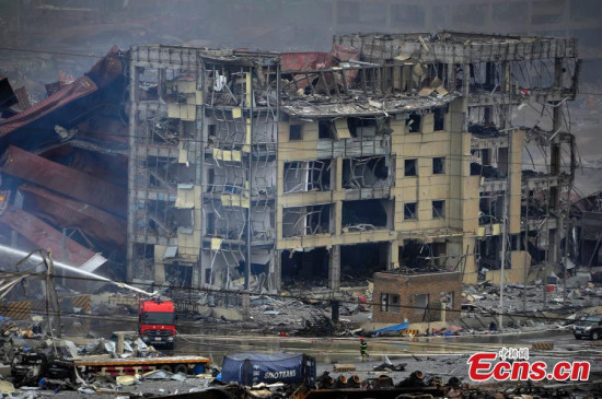 Photo taken on Aug. 15, 2015 shows a scene of the warehouse explosion site in Tianjin, north China. Forty-six people have been rescued from the Tianjin blasts site, according to the fifth press conference on the explosion Saturday afternoon. (CNS photo/Tong Yu) Photo taken on Aug. 15, 2015 shows a scene of the warehouse explosion site in Tianjin, north China. Forty-six people have been rescued from the Tianjin blasts site, according to the fifth press conference on the explosion Saturday afternoon. (CNS photo/Tong Yu)