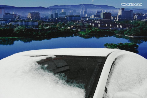 A car covered by snow is seen in Jinan, capital of east China's Shandong Province, Feb. 13, 2016. A cold wave hit Jinan on Saturday, bringing a 12 degrees Celsius drop to local temperature. (Photo: Xinhua/Feng Jie) A car covered by snow is seen in Jinan, capital of east China's Shandong Province, Feb. 13, 2016. A cold wave hit Jinan on Saturday, bringing a 12 degrees Celsius drop to local temperature. (Photo: Xinhua/Feng Jie)