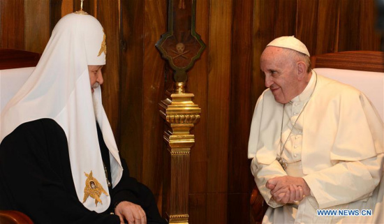 Catholic Pope Francis (R) meets with Russian Orthodox Patriarch Kirill in Havana, Cuba, Feb. 12, 2016. Catholic Pope Francis held a three-hour landmark meeting Friday with Russian Orthodox Patriarch Kirill after arriving here for a stopover on his flight to Mexico. This is the first meeting between the two churches since Christianity split nearly 1,000 years ago. (Photo: Xinhua/Str)
