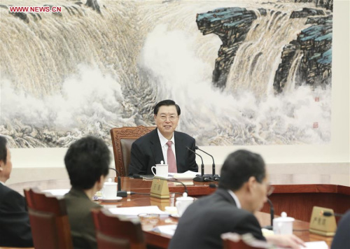 Zhang Dejiang (back), chairman of the Standing Committee of China's National People's Congress (NPC), presides over the 61st chairpersons' meeting of the 12th NPC Standing Committee in Beijing, capital of China, Feb. 15, 2016. (Photo: Xinhua/Ding Lin)