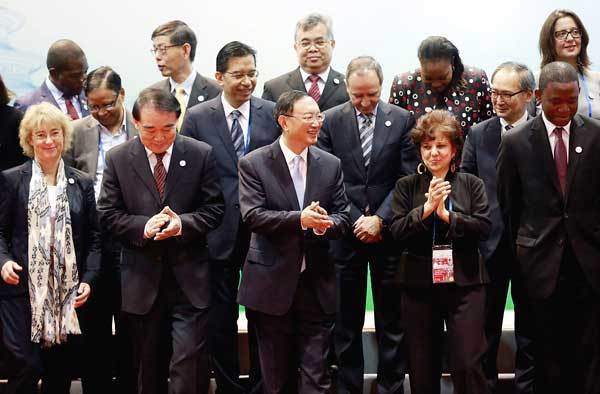 State Councilor Yang Jiechi (front, third from left) joins other officials from G20 economies at the First G20 Sherpa Meeting in Beijing on Thursday. The three-day gathering forms part of the runup to the G20 Summit in Hangzhou, Zhejiang province. FENG YONGBIN / CHINA DAILY