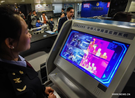 A staff worker of inspection and quarantine administration looks at the screen of body temperature monitoring equipment at Guangzhou Baiyun International Airport in Guangzhou, south China's Guangdong Province, Feb. 16, 2016. (Photo: Xinhua/Liu Dawei) A staff worker of inspection and quarantine administration looks at the screen of body temperature monitoring equipment at Guangzhou Baiyun International Airport in Guangzhou, south China's Guangdong Province, Feb. 16, 2016. (Photo: Xinhua/Liu Dawei)