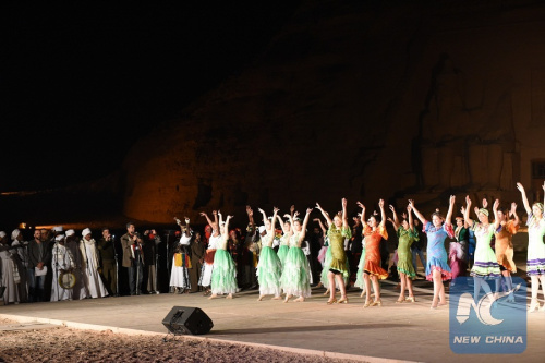 Chinese artists, joined by others from at least seven countries, performed at the fourth Aswan International Festival for Arts and Culture on Feb. 21, 2016, when Egypt marks the sun illumination of the face of ancient King Ramses II at famous Abu Simbel temple in southern Aswan province. (Xinhua Photo) Chinese artists, joined by others from at least seven countries, performed at the fourth Aswan International Festival for Arts and Culture on Feb. 21, 2016, when Egypt marks the sun illumination of the face of ancient King Ramses II at famous Abu Simbel temple in southern Aswan province. (Xinhua Photo)