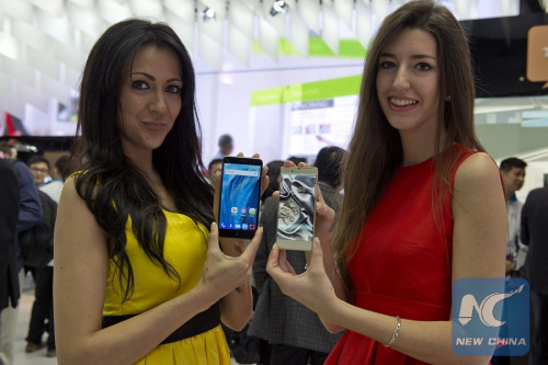 Models show the ZTE V7 device (L) and the Nubia Z9 (R) at the Mobile World Congress 2016 in Barcelona, Spain, Feb. 22, 2016. The Mobile World Congress (MWC), the most important mobile communication event in the world, opened its doors in Barcelona on Monday. (Photo: Xinhua/Lino De Vallier) Models show the ZTE V7 device (L) and the Nubia Z9 (R) at the Mobile World Congress 2016 in Barcelona, Spain, Feb. 22, 2016. The Mobile World Congress (MWC), the most important mobile communication event in the world, opened its doors in Barcelona on Monday. (Photo: Xinhua/Lino De Vallier)