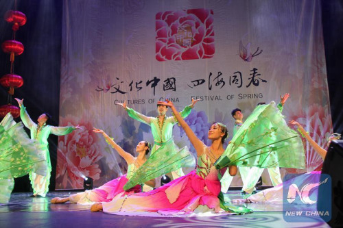 Chinese dancers perform the Jasmine Flower dance at a show dubbed Cultures of China, Festival of Spring in Cape Town, South Africa, Feb. 20, 2016. (Photo: Xinhua/Gao Yuan) Chinese dancers perform the Jasmine Flower dance at a show dubbed Cultures of China, Festival of Spring in Cape Town, South Africa, Feb. 20, 2016. (Photo: Xinhua/Gao Yuan)