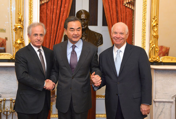 Chinese Foreign Minister Wang Yi (center) poses for a photo with Senate Foreign Relations Committee Chairman Bob Corker (left) and ranking member Ben Cardin during a visit to the Capitol Hill on Wednesday. (Photo/Xinhua) Chinese Foreign Minister Wang Yi (center) poses for a photo with Senate Foreign Relations Committee Chairman Bob Corker (left) and ranking member Ben Cardin during a visit to the Capitol Hill on Wednesday. (Photo/Xinhua)