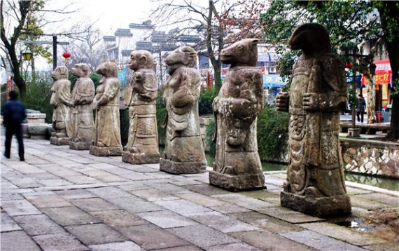 Stone statues on the streets of the ancient town of Nanxun, Zhejiang province. Stone statues on the streets of the ancient town of Nanxun, Zhejiang province.