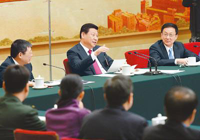 Chinese President Xi Jinping (C), also general secretary of the Communist Party of China (CPC) Central Committee and chairman of the Central Military Commission, joins the panel discussion with National People's Congress (NPC) deputies from Shanghai during the second session of the 12th NPC, in Beijing, March 5, 2014. (Photo/People's Daily Online) Chinese President Xi Jinping (C), also general secretary of the Communist Party of China (CPC) Central Committee and chairman of the Central Military Commission, joins the panel discussion with National People's Congress (NPC) deputies from Shanghai during the second session of the 12th NPC, in Beijing, March 5, 2014. (Photo/People's Daily Online)