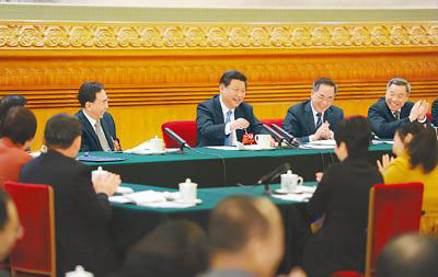 Chinese President Xi Jinping (C), also general secretary of the Communist Party of China (CPC) Central Committee and chairman of the Central Military Commission, joins the panel discussion with National People's Congress (NPC) deputies from Guangdong province during the second session of the 12th NPC, in Beijing, March 6, 2014. (Photo/People's Daily Online) Chinese President Xi Jinping (C), also general secretary of the Communist Party of China (CPC) Central Committee and chairman of the Central Military Commission, joins the panel discussion with National People's Congress (NPC) deputies from Guangdong province during the second session of the 12th NPC, in Beijing, March 6, 2014. (Photo/People's Daily Online)