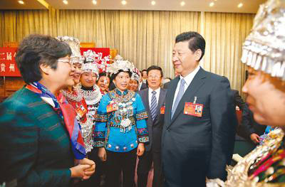 Chinese President Xi Jinping (C), also general secretary of the Communist Party of China (CPC) Central Committee and chairman of the Central Military Commission, joins the panel discussion with National People's Congress (NPC) deputies from Guizhou province during the second session of the 12th NPC, in Beijing, March 7, 2014. (Photo/People's Daily Online) Chinese President Xi Jinping (C), also general secretary of the Communist Party of China (CPC) Central Committee and chairman of the Central Military Commission, joins the panel discussion with National People's Congress (NPC) deputies from Guizhou province during the second session of the 12th NPC, in Beijing, March 7, 2014. (Photo/People's Daily Online)