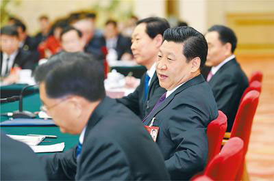 Chinese President Xi Jinping (C), also general secretary of the Communist Party of China (CPC) Central Committee and chairman of the Central Military Commission, joins the panel discussion with National People's Congress (NPC) deputies from Anhui province during the second session of the 12th NPC, in Beijing, March 9, 2014. (Photo/People's Daily Online) Chinese President Xi Jinping (C), also general secretary of the Communist Party of China (CPC) Central Committee and chairman of the Central Military Commission, joins the panel discussion with National People's Congress (NPC) deputies from Anhui province during the second session of the 12th NPC, in Beijing, March 9, 2014. (Photo/People's Daily Online)