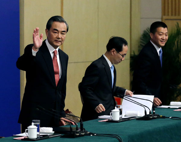 Chinese Foreign Minister Wang Yi greets reporters at a press conference in Beijing March 8, 2016. (Kuang Linhua/China Daily) Chinese Foreign Minister Wang Yi greets reporters at a press conference in Beijing March 8, 2016. (Kuang Linhua/China Daily)